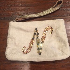NWOTMonogrammed “N” cloth wristlet.